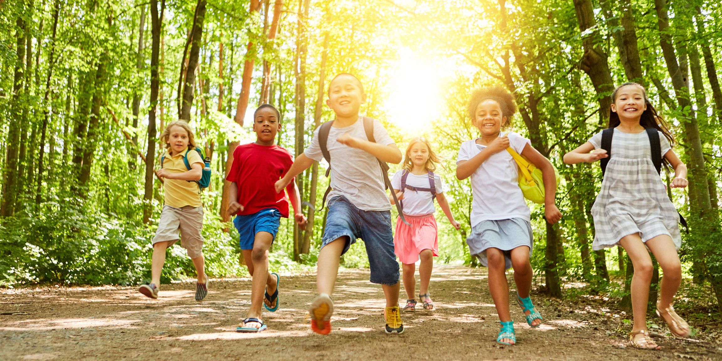 Children Run Together to the Summer Camp